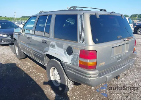 1997 Jeep Grand Cherokee Limited z USA, uszkodzony, nr VIN 1J4GZ78Y5VC613495